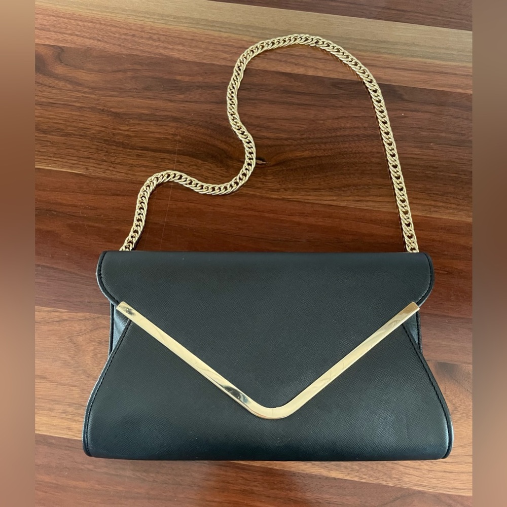 Black gold clutch